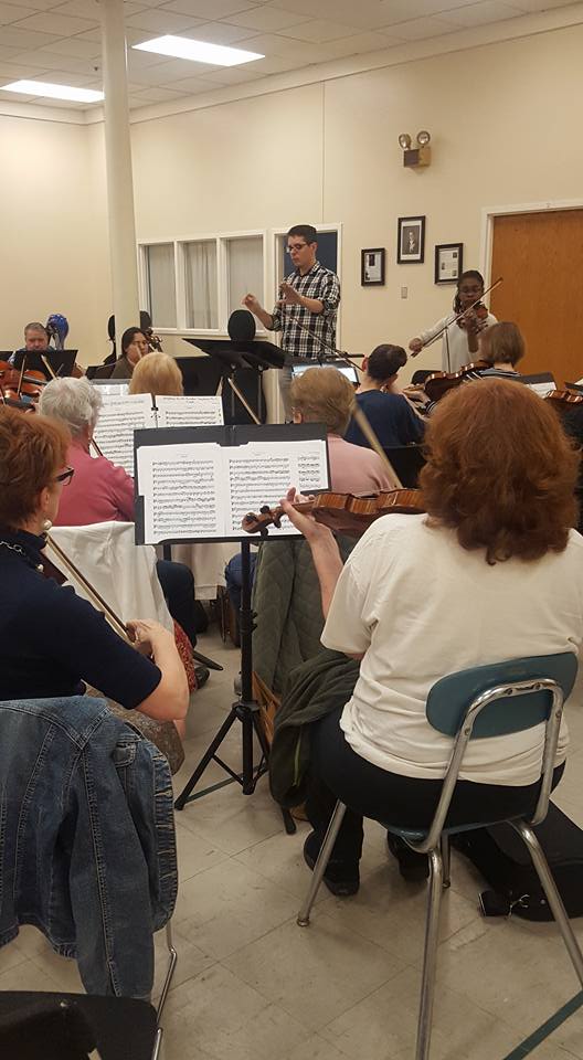 HRP-Audition-and-Practice Orchestra auditions and practices together with conductor at front